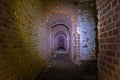 Corridors of the old fortification structure of red brick Royalty Free Stock Photo