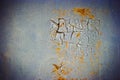 Corroded blue metal background. Rusted painted metal wall. Rusty metal background with streaks of rust. Rust stains. The