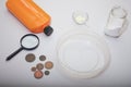 Corroded copper coins. Lay on the table surface before cleaning and patinating. Nearby phosphoric acid and soda for cleaning from Royalty Free Stock Photo