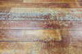 Damaged seasoned wooden floor plank with scratch marks needs res