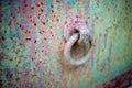 Corroded Painted Steel Background With Eye Bolt