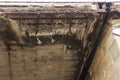Corrosion of the concrete structure of the bridge due to the precipitation and chemical reagents. Royalty Free Stock Photo