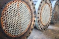 Corrosion, refinery heat exchanger chiller tubes with flange system. Two Industrial heat exchangers or boiler rusty tube Royalty Free Stock Photo