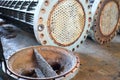 Corrosion, refinery heat exchangers chiller tubes with flange system. Row of Industrial heat exchangers or boilers with Royalty Free Stock Photo