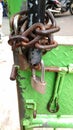 Corrosive chain and padlock at iron green gate Royalty Free Stock Photo