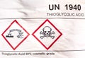 Corrosive material Symbol on label at the acid container