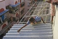 Corrugated Asbestos Cement Roof sheet fixing by work man Lokgram Kalyan Maharashtra India