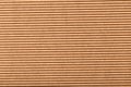 Corrugated cardboard for packing. abstract background horizontal lines with wavy lines of beige color Royalty Free Stock Photo