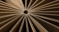 Corrugated cardboard sheets are arranged in a radial pattern, converging at a central Royalty Free Stock Photo