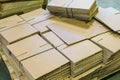Corrugated cardboard sheets in piles Royalty Free Stock Photo