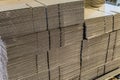 Corrugated cardboard sheets in piles Royalty Free Stock Photo
