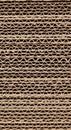 Corrugated cardboard structure with alternating layers of flat linerboard and fluted Royalty Free Stock Photo