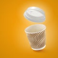 Corrugated fiberboard coffe cup to go on yellow background