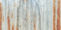 Corrugated galvanized rusty metal sheet background with old aged rust texture on zinc tin or iron steel grunge wall panel Royalty Free Stock Photo