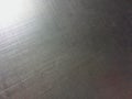 Metal surface, aluminum alloy, magnesium alloy, sun flare, grainy texture Royalty Free Stock Photo