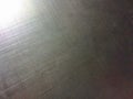 Metal surface, aluminum alloy, magnesium alloy, sun flare, grainy texture Royalty Free Stock Photo