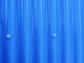 Blueish metallic corrugated sheet roof texture. Deep blue profiled sheet panel. Corrugated Metal Roof Exterior Close up Royalty Free Stock Photo