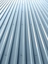 Corrugated metal roof with rivets on industrial building Royalty Free Stock Photo