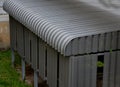 corrugated metal sheet garage, shed. rounded edges in titanium