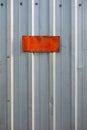 Corrugated Metal Wall with Rusty Blank Sign Royalty Free Stock Photo