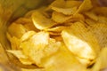 Corrugated potato chips in a pack, close-up.Selective focus.
