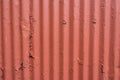 Corrugated Steel Wall with Thick Orange Paint