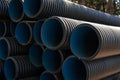 Corrugated water pipes of large diameter prepared for laying, copy space Royalty Free Stock Photo