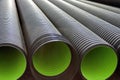 Large corrugated PVC pipes for drainage. Corrugated water pipes of large diameter prepared for laying Royalty Free Stock Photo