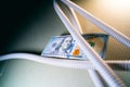 Corrugated wiring and cash close-up. Gray corrugated tube for electrical wires and one hundred dollars