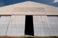 Corrugated zinc hangar with open doors Royalty Free Stock Photo