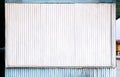 Corrugated zinc surface white and blue of the house is a roadside shop for the background and texture. With copy space for text. Royalty Free Stock Photo