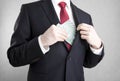 Corruption. Man putting polish money in suit jacket pocket. Royalty Free Stock Photo