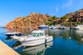 PORTO, CORSICA ISLAND - JUN 27, 2015: boats in Porto harbour in early morning. Porto is a small village to the west of Corsica, Royalty Free Stock Photo