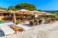 Sunbeds on beachSunbeds on sandy Palombaggia beach, Corsica island, France