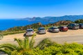 CORSICA ISLAND, FRANCE - JUN 27, 2015: cars parked along a road from Piana to Porto near Calanches de Piana which is a nature