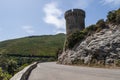 Corsica, Cap Corse, Tower of Losse, Tower of l`Osse, Haute Corse, Genoese tower, France, Europe, island, winding road Royalty Free Stock Photo
