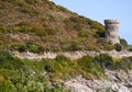 Corsica, Cap Corse, Tower of Losse, Tower of l`Osse, Haute Corse, Genoese tower, France, Europe, island, winding road Royalty Free Stock Photo