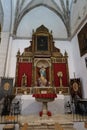 Vertical view. Side altar of Divino Salvador church in the Andalusian magical town of Cortegana, Huelva, Spain