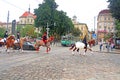 Cortege with riders on horseback on the streets in historical city center, Lviv