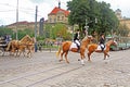 Cortege with riders on horseback on the streets in historical city center, Lviv Royalty Free Stock Photo