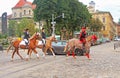 Cortege with riders on horseback on the streets