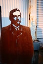 Outdoor historic migrant cutout in rusted corten steel of Many Lovers exhibition at sunset on Queens Wharf, Auckland, New Zealand