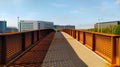 Corten steel pedestrian bridge across a motorway Royalty Free Stock Photo