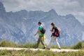 A couple of hikers on the mountains of the Dolomites