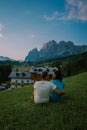 Cortina d'Ampezzo town panoramic view with alpine green landscape and massive Dolomites Alps in the background. Province Royalty Free Stock Photo