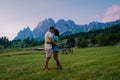 Cortina d& x27;Ampezzo town panoramic view with alpine green landscape and massive Dolomites Alps in the background. Province Royalty Free Stock Photo