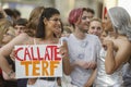 Demonstrators carrying posters during the gay pride parade