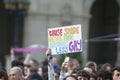 Demonstrators carrying posters during the gay pride parade