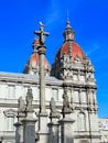 A CoruÃÂ±a City Hall building and Christian cross against blue sky Royalty Free Stock Photo