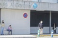 CoruÃÂ±a-Spain.Elderly person leaves the hospital with a crutch and face mask for covid-19